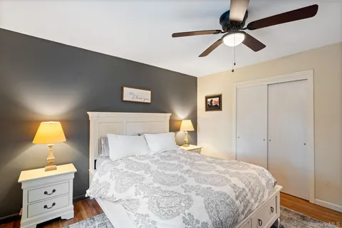 a reading room with furniture and a window