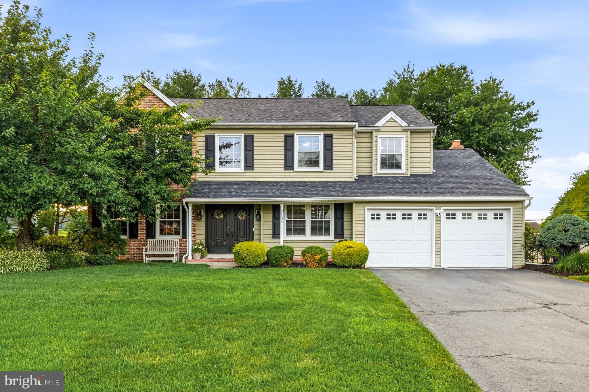 2134 West Wellington Road Newtown, PA 18940 - Photo 2 of 42 Charming home with lush greenery.
