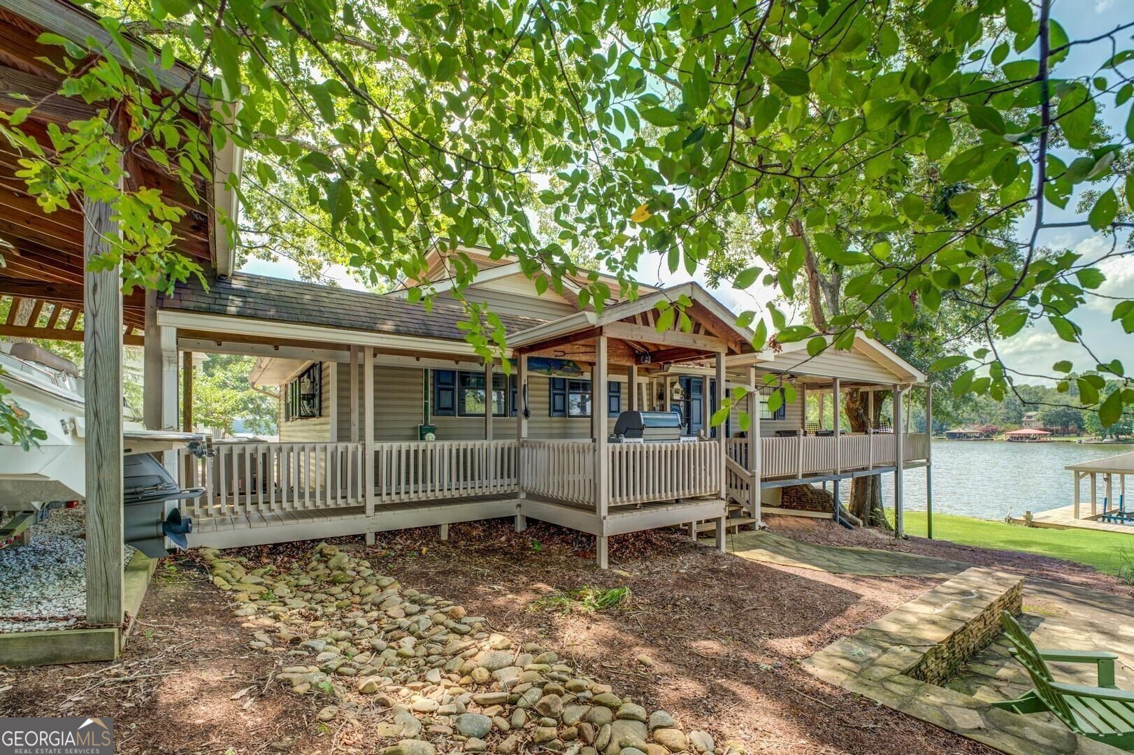 393 Templeton Road Mansfield, GA 30055 - Photo 12 of 54 a front view of a house with a garden
