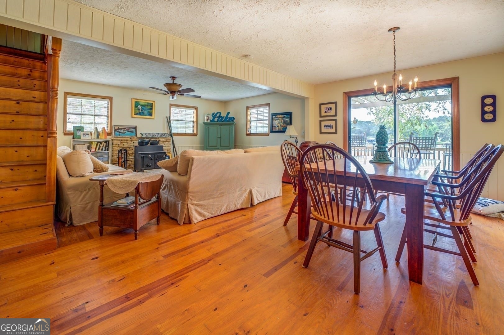 393 Templeton Road Mansfield, GA 30055 - Photo 17 of 54 a view of a dining room with furniture window and wooden floor
