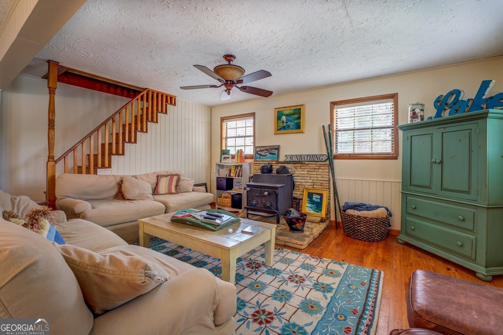 393 Templeton Road Mansfield, GA 30055 - Photo 20 of 54 a living room with furniture a rug and a window