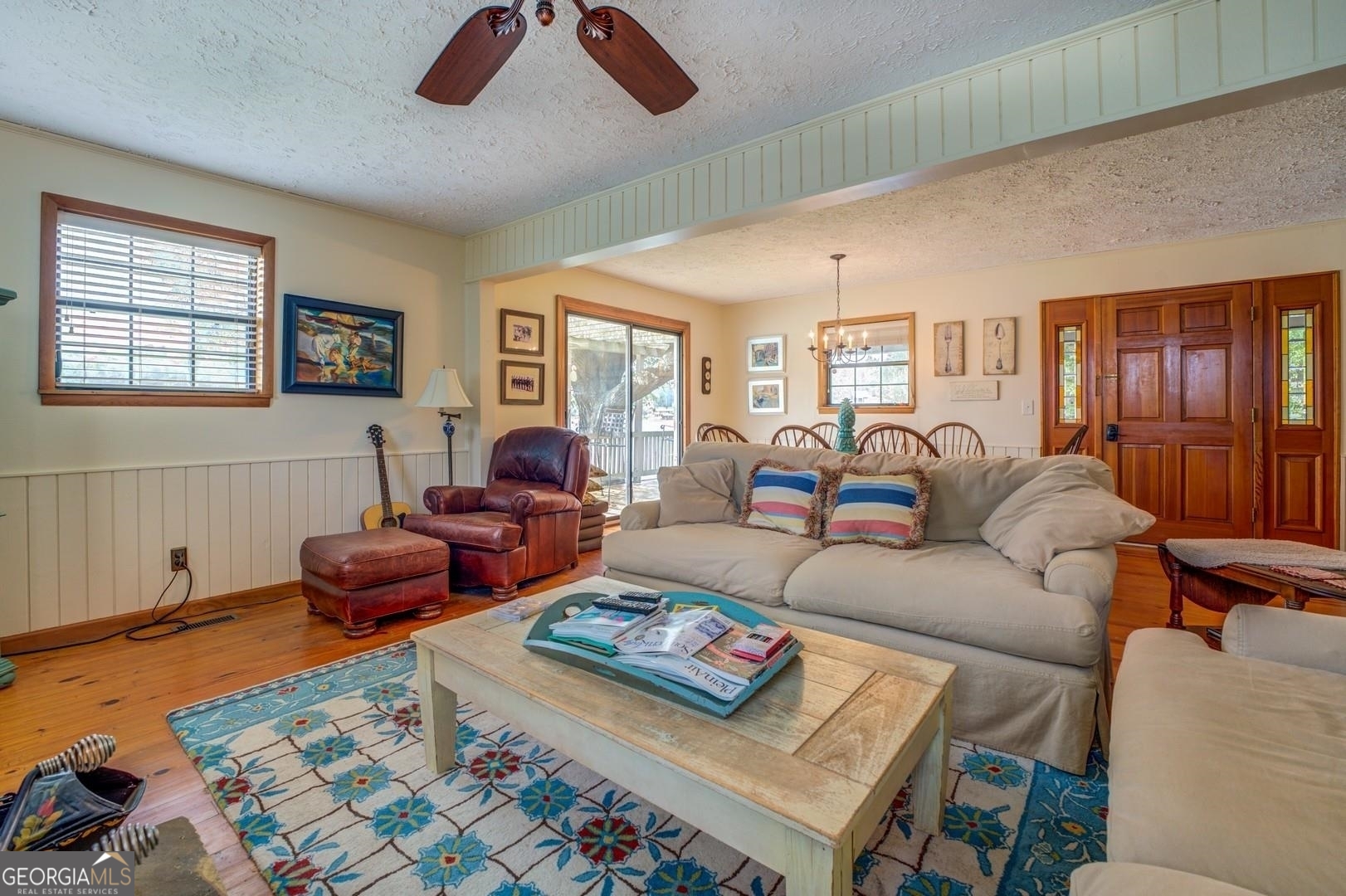 393 Templeton Road Mansfield, GA 30055 - Photo 23 of 54 a living room with furniture a rug and a window