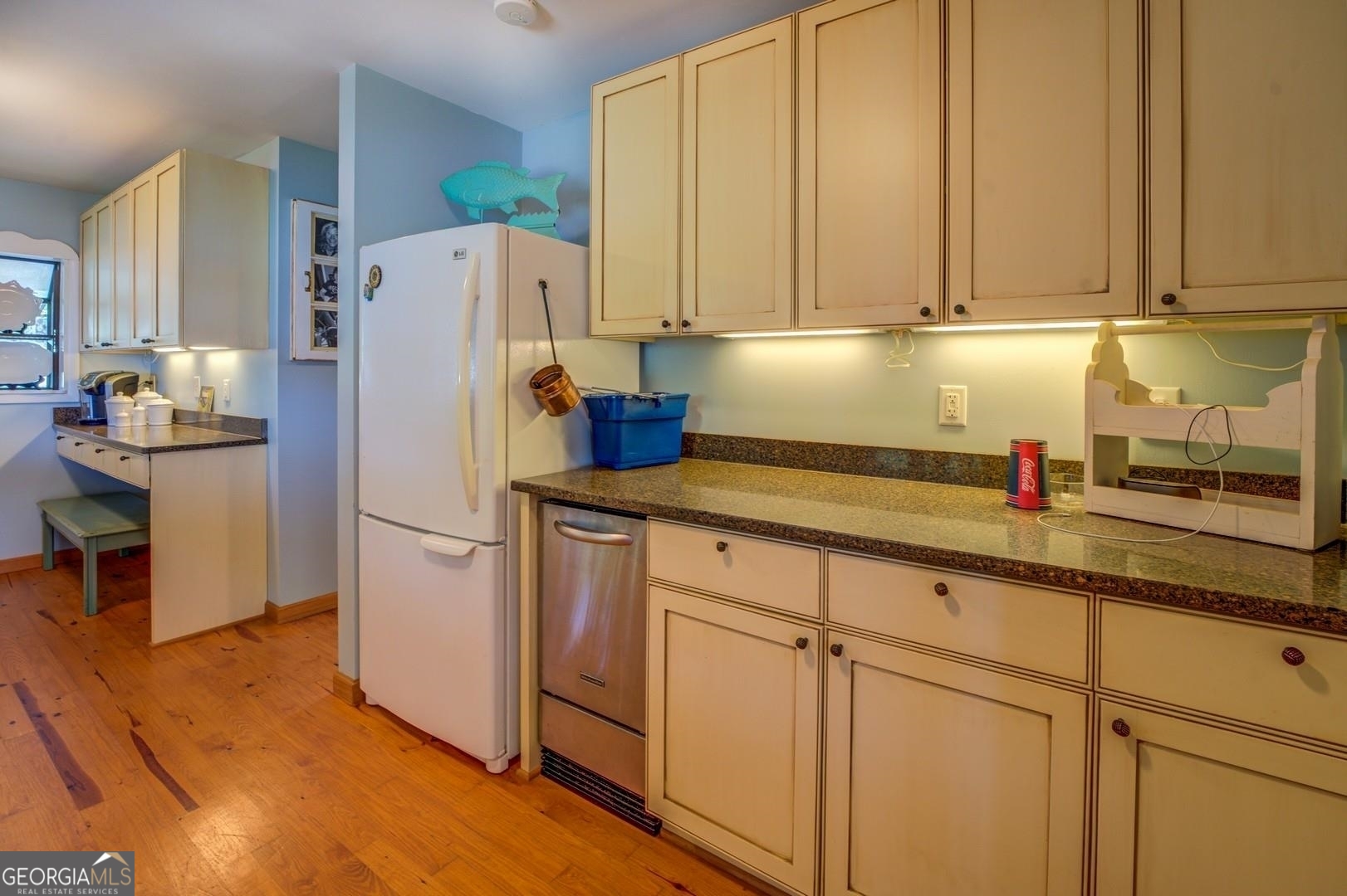 393 Templeton Road Mansfield, GA 30055 - Photo 26 of 54 a kitchen with refrigerator and cabinets