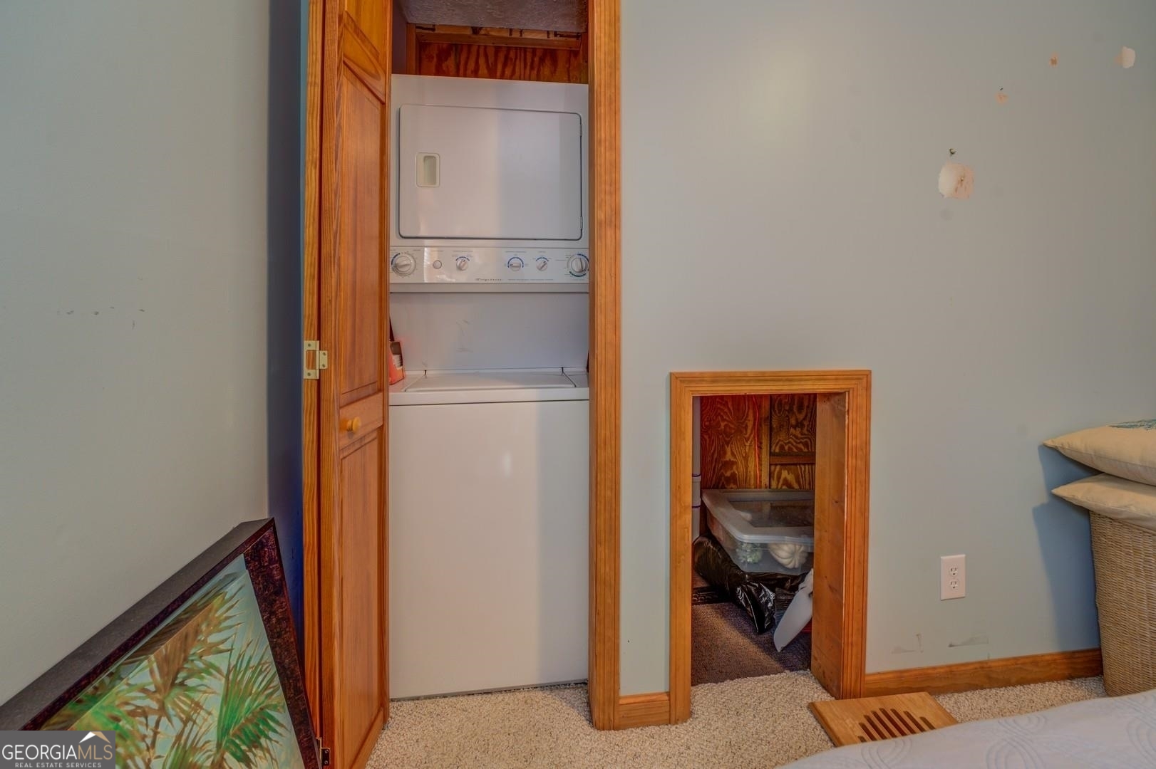 393 Templeton Road Mansfield, GA 30055 - Photo 33 of 54 a view of walk in closet with clothes and shoes