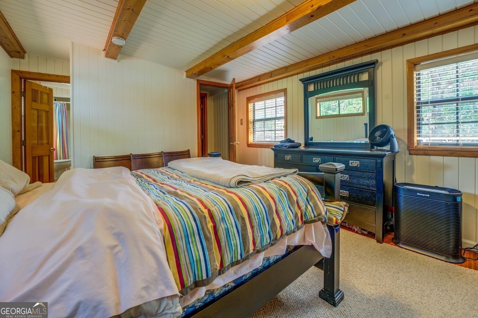 393 Templeton Road Mansfield, GA 30055 - Photo 37 of 54 a bedroom with a bed and window