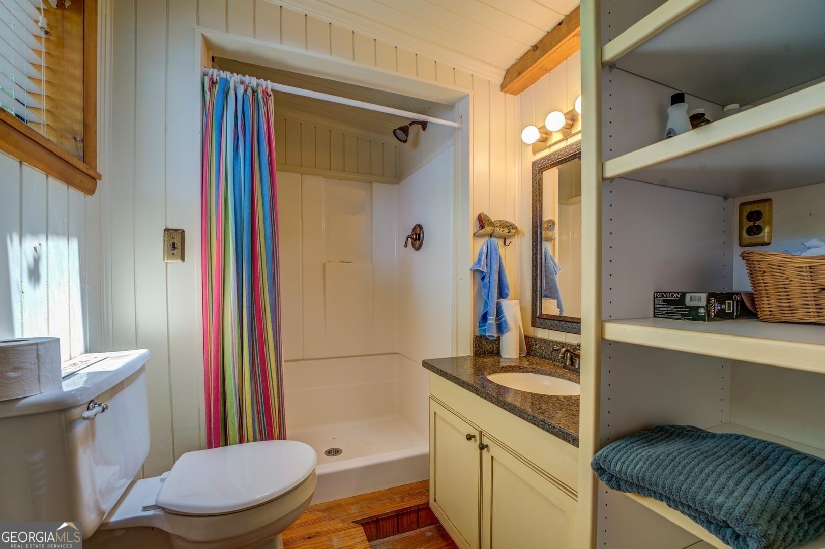 393 Templeton Road Mansfield, GA 30055 - Photo 39 of 54 a bathroom with a sink a toilet a mirror and shower