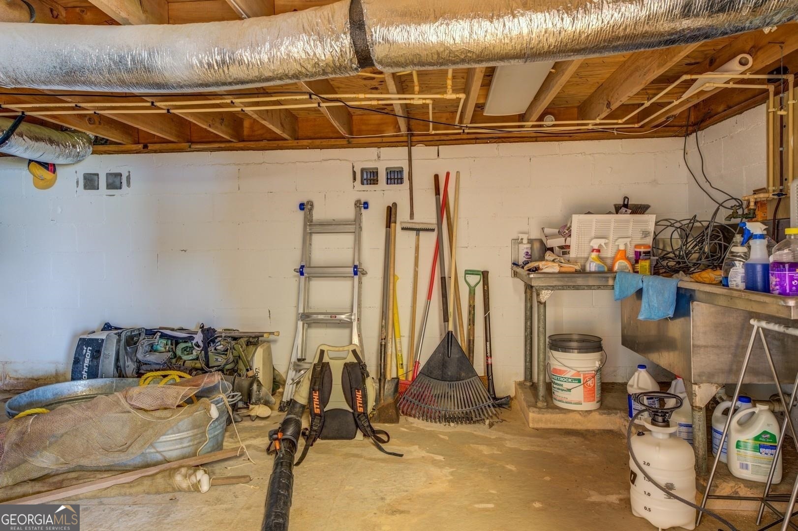 393 Templeton Road Mansfield, GA 30055 - Photo 54 of 54 a view of a room with gym equipment