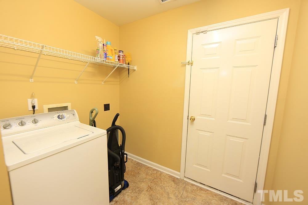 1520 Cricket Ridge Drive Raleigh, NC 27610 - Photo 16 of 18 1st floor laundry room has another large closet.