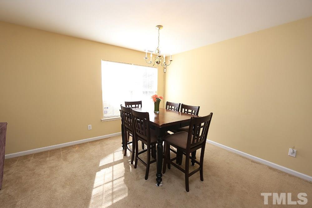 1520 Cricket Ridge Drive Raleigh, NC 27610 - Photo 7 of 18 Large enough for a bigger table. Plenty of natural light.