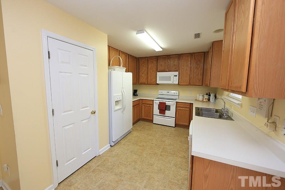 1520 Cricket Ridge Drive Raleigh, NC 27610 - Photo 9 of 18 With pantry.