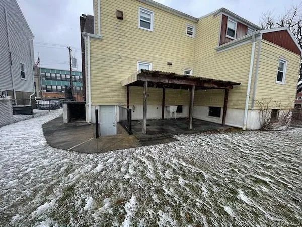 a view of a house with a patio