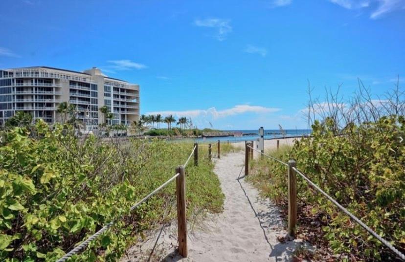 950 Ponce De Leon Road, Unit 408 Boca Raton, FL 33432 - Photo 40 of 50 a view of a lake with a city skyline in the background