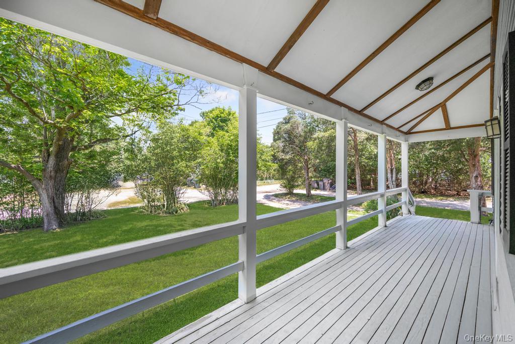 4 Cooks Lane Westhampton, NY 11977 - Photo 6 of 33 Wooden terrace with a lawn