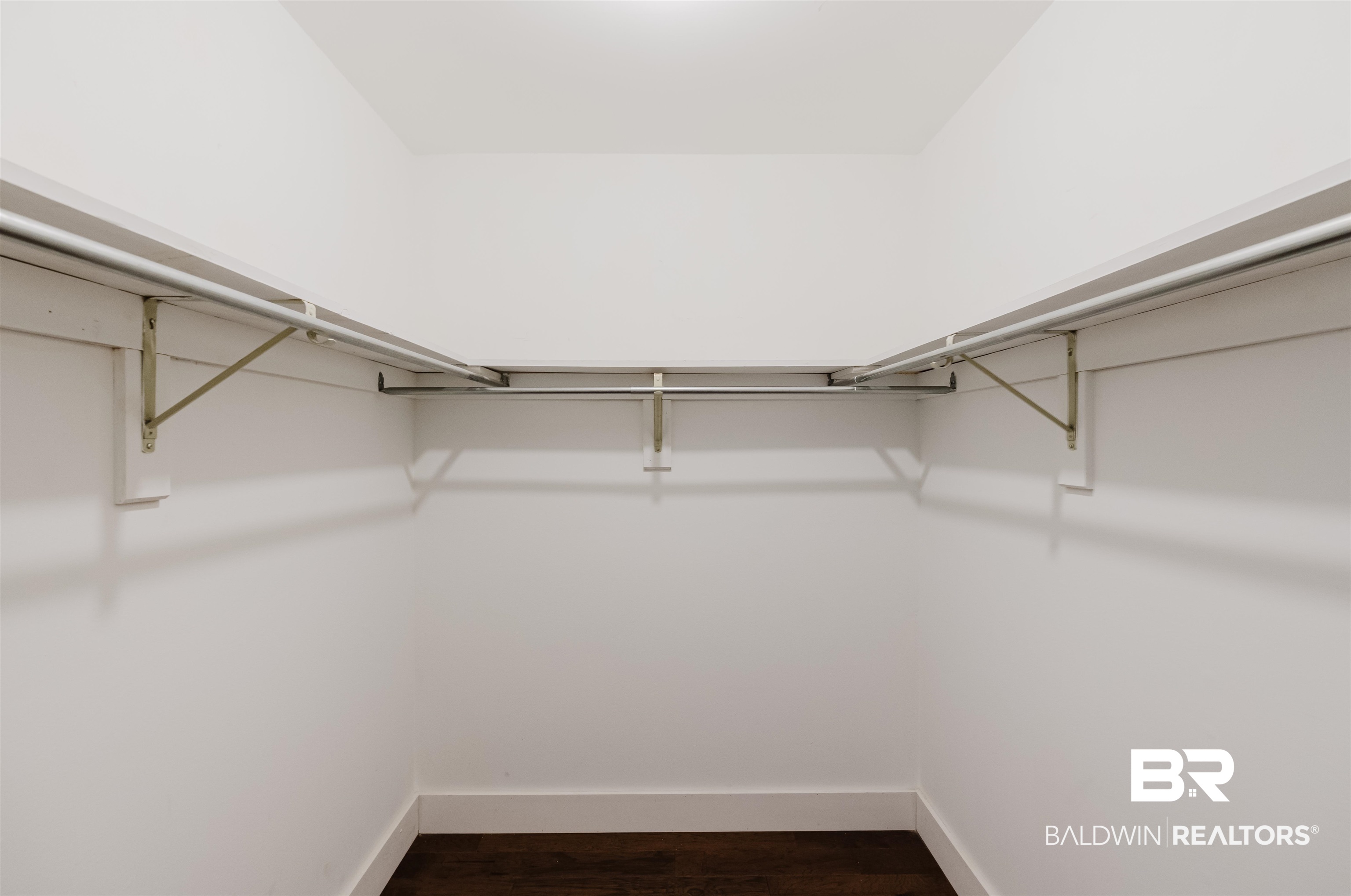 20460 Bishop Road Fairhope, AL 36532 - Photo 30 of 41 Spacious closet featuring dark wood-style flooring