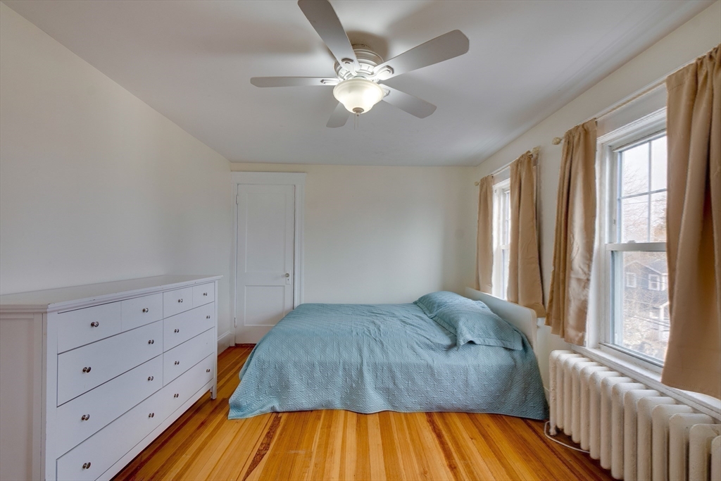 30 Kilsythe Road Arlington, MA 02476 - Photo 20 of 31 a bedroom with a bed and a dresser