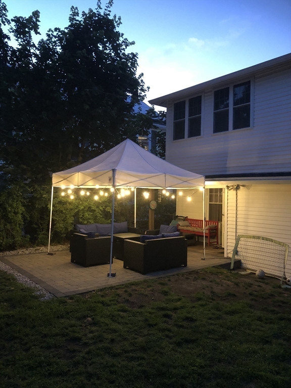30 Kilsythe Road Arlington, MA 02476 - Photo 31 of 31 a view of a patio with couches plants and large tree