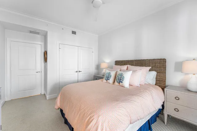 a bedroom with a bed and a night lamp