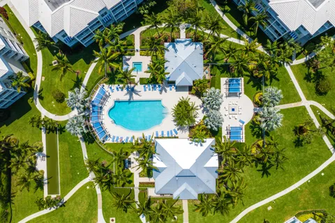 a view of a lake with lots of residential buildings