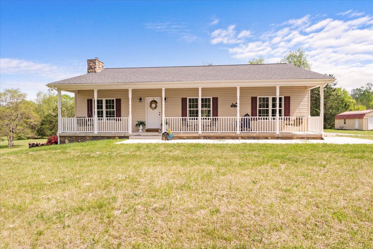 4133 Grove Hill Road Fincastle, VA 24090 - Photo 1 of 66 a front view of house with outdoor seating