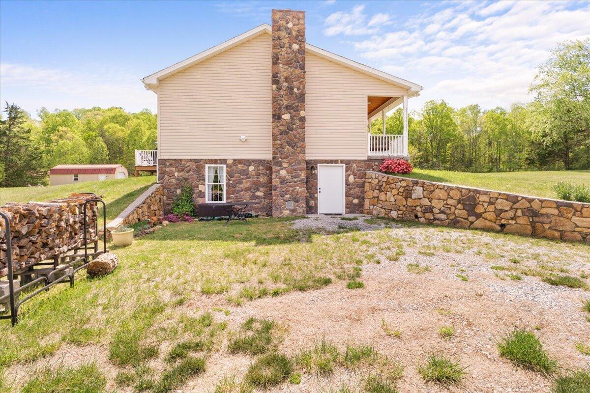 4133 Grove Hill Road Fincastle, VA 24090 - Photo 37 of 66 a view of a house with a yard