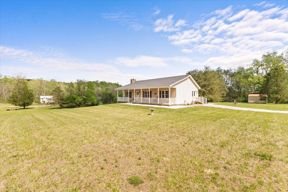 4133 Grove Hill Road Fincastle, VA 24090 - Photo 40 of 66 a house view with swimming pool in front of it