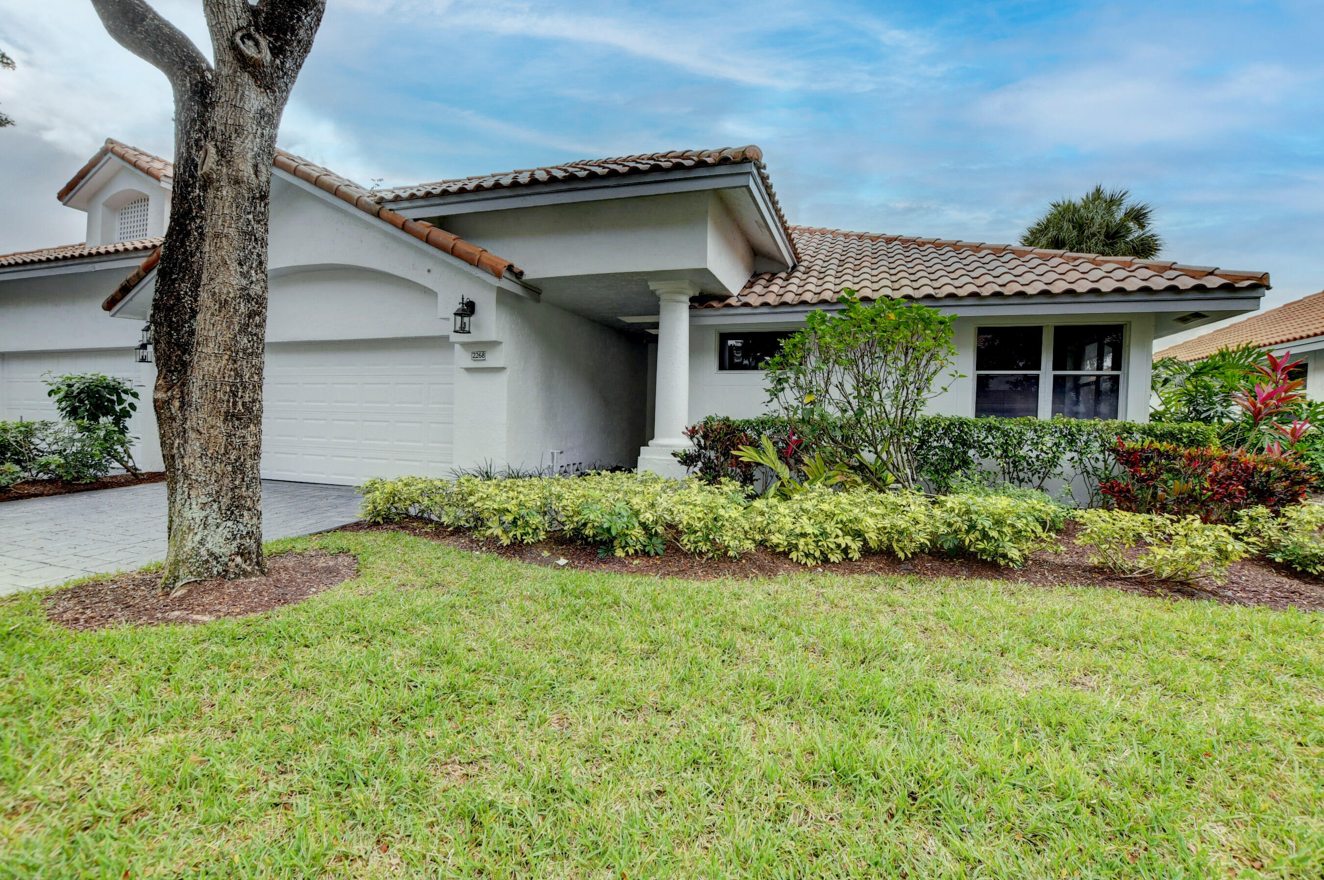 2268 Northwest 52nd Street Boca Raton, FL 33496 - Photo 2 of 44 front view