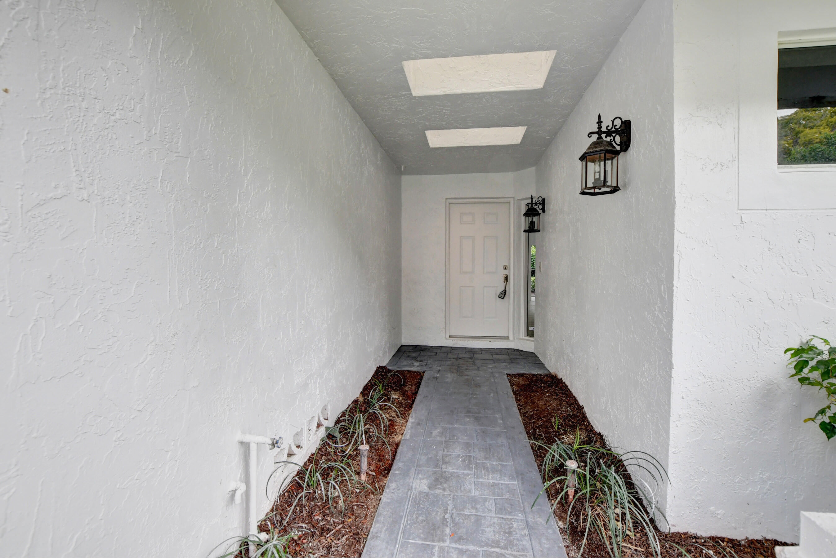 2268 Northwest 52nd Street Boca Raton, FL 33496 - Photo 3 of 44 entrace