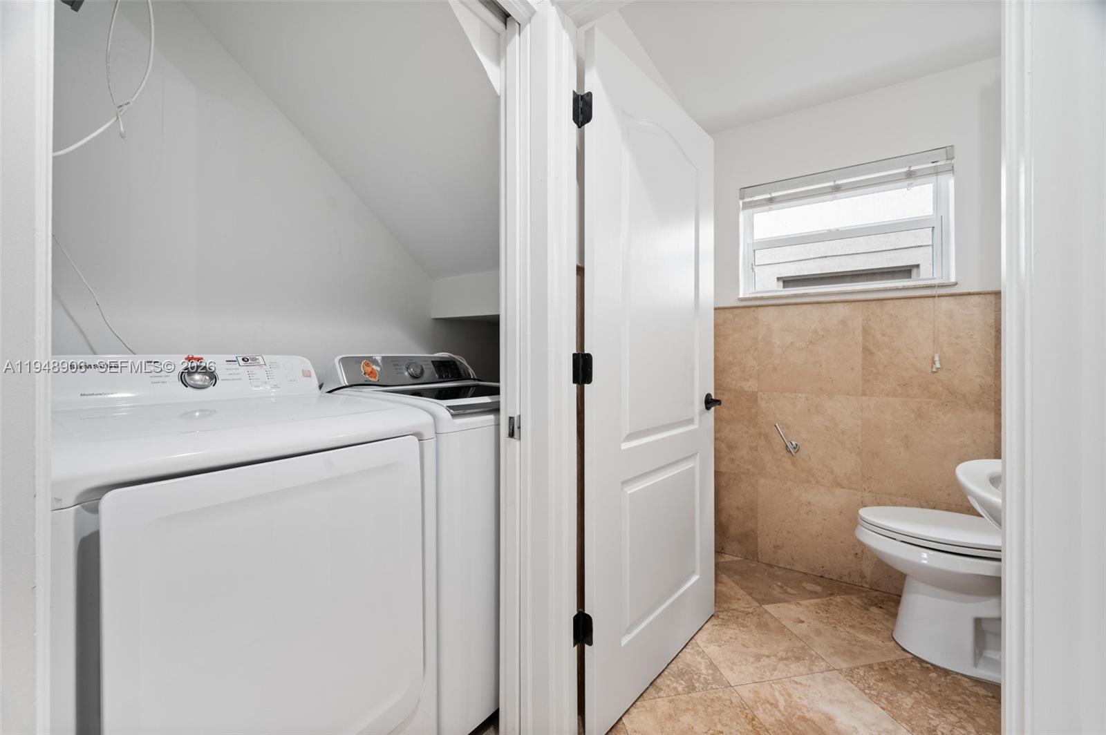 2922 Virginia Street, Unit 2922 Miami, FL 33133 - Photo 12 of 23 a utility room with dryer and washer