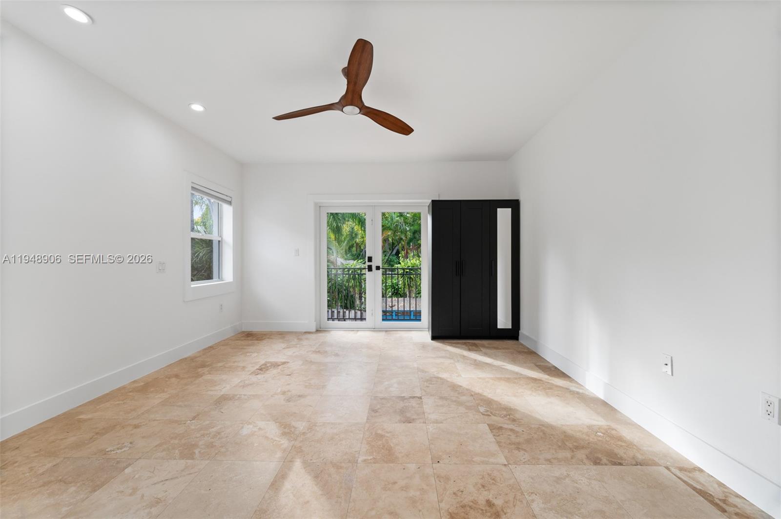 2922 Virginia Street, Unit 2922 Miami, FL 33133 - Photo 14 of 23 a view of an empty room with a window