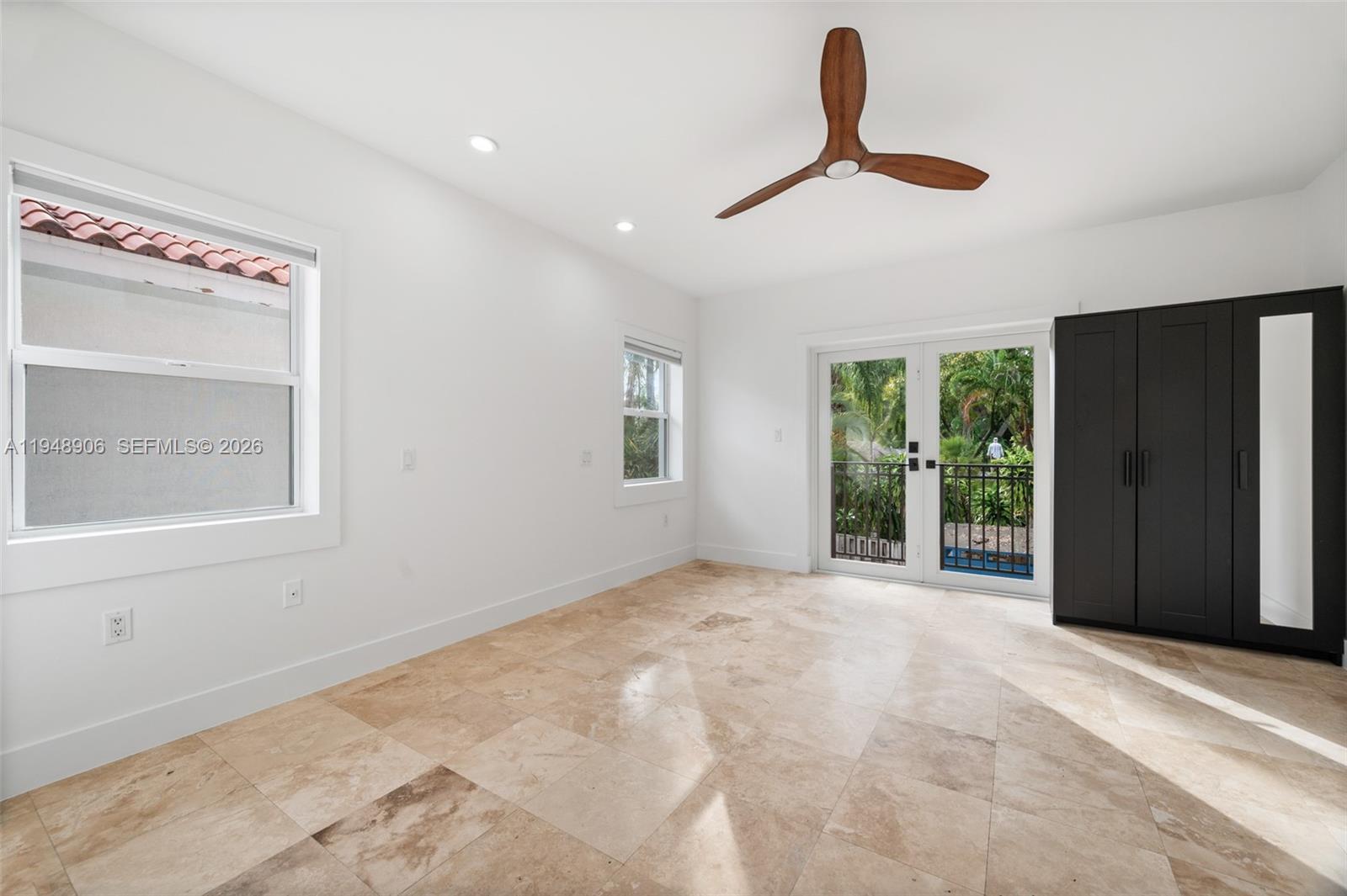 2922 Virginia Street, Unit 2922 Miami, FL 33133 - Photo 15 of 23 a view of an empty room with a window