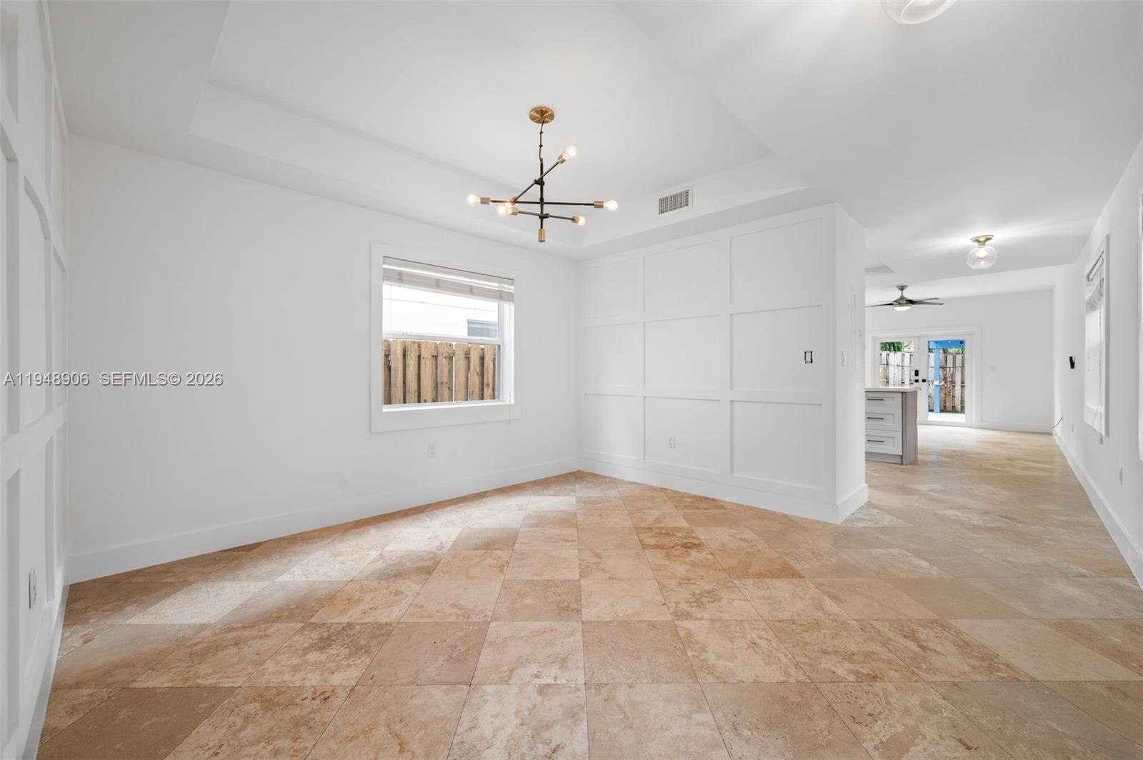 2922 Virginia Street, Unit 2922 Miami, FL 33133 - Photo 5 of 23 a view of an empty room with a window