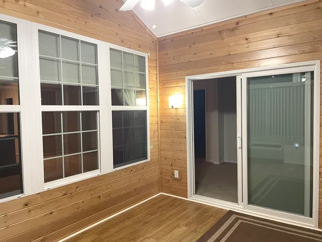 a view of a house with a large window