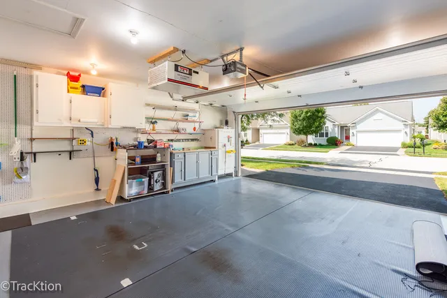 a kitchen with stainless steel appliances a stove and cabinets