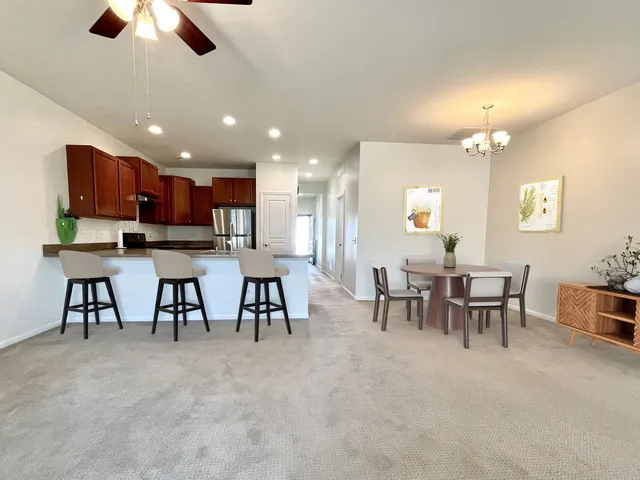 a view of a dining room with furniture