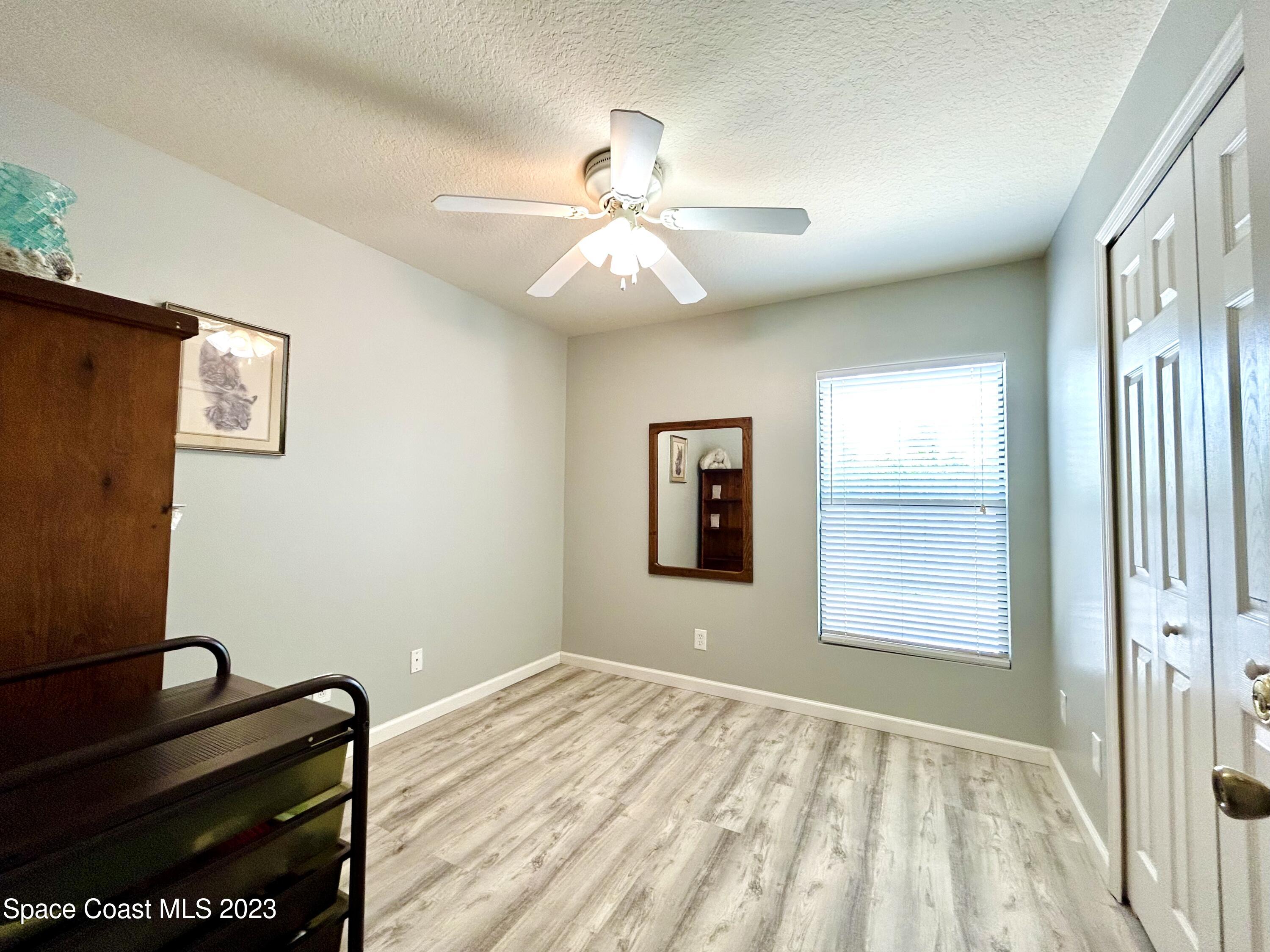 1160 Luminary Circle, Unit 105 Melbourne, FL 32901 - Photo 23 of 35 a view of an empty room and window