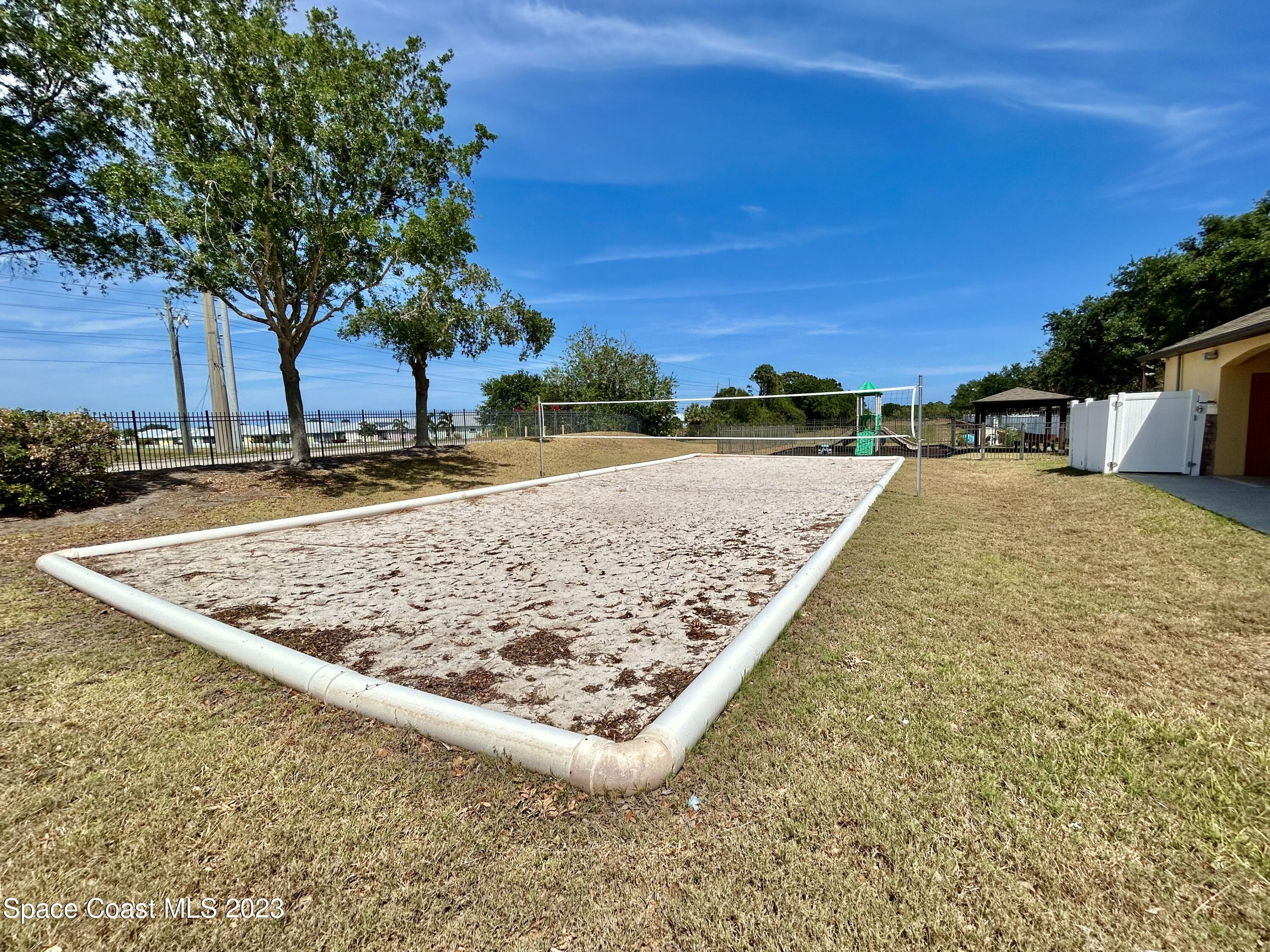 1160 Luminary Circle, Unit 105 Melbourne, FL 32901 - Photo 34 of 35 a view of a swimming pool with an outdoor space