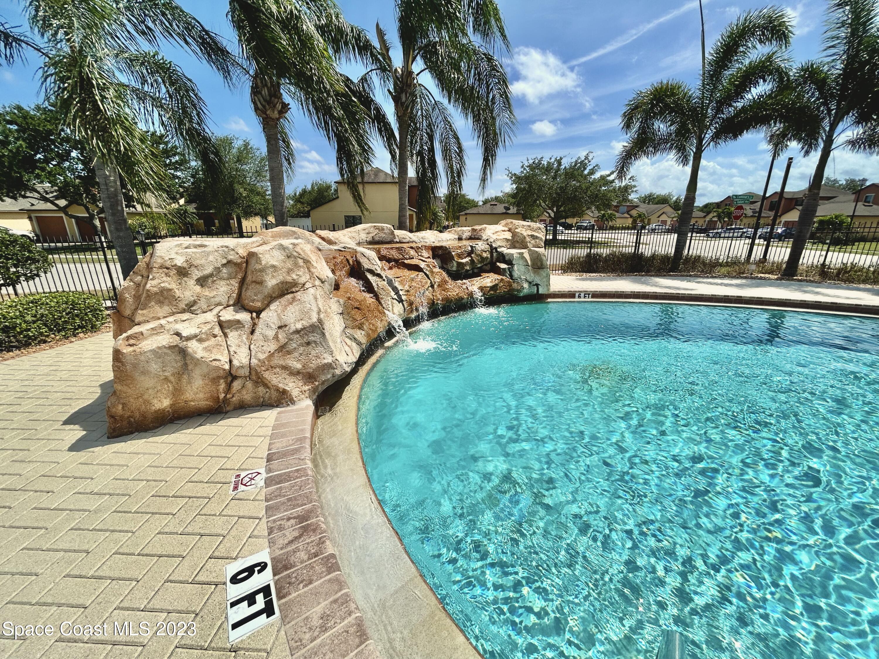1160 Luminary Circle, Unit 105 Melbourne, FL 32901 - Photo 4 of 35 a view of outdoor space with garden