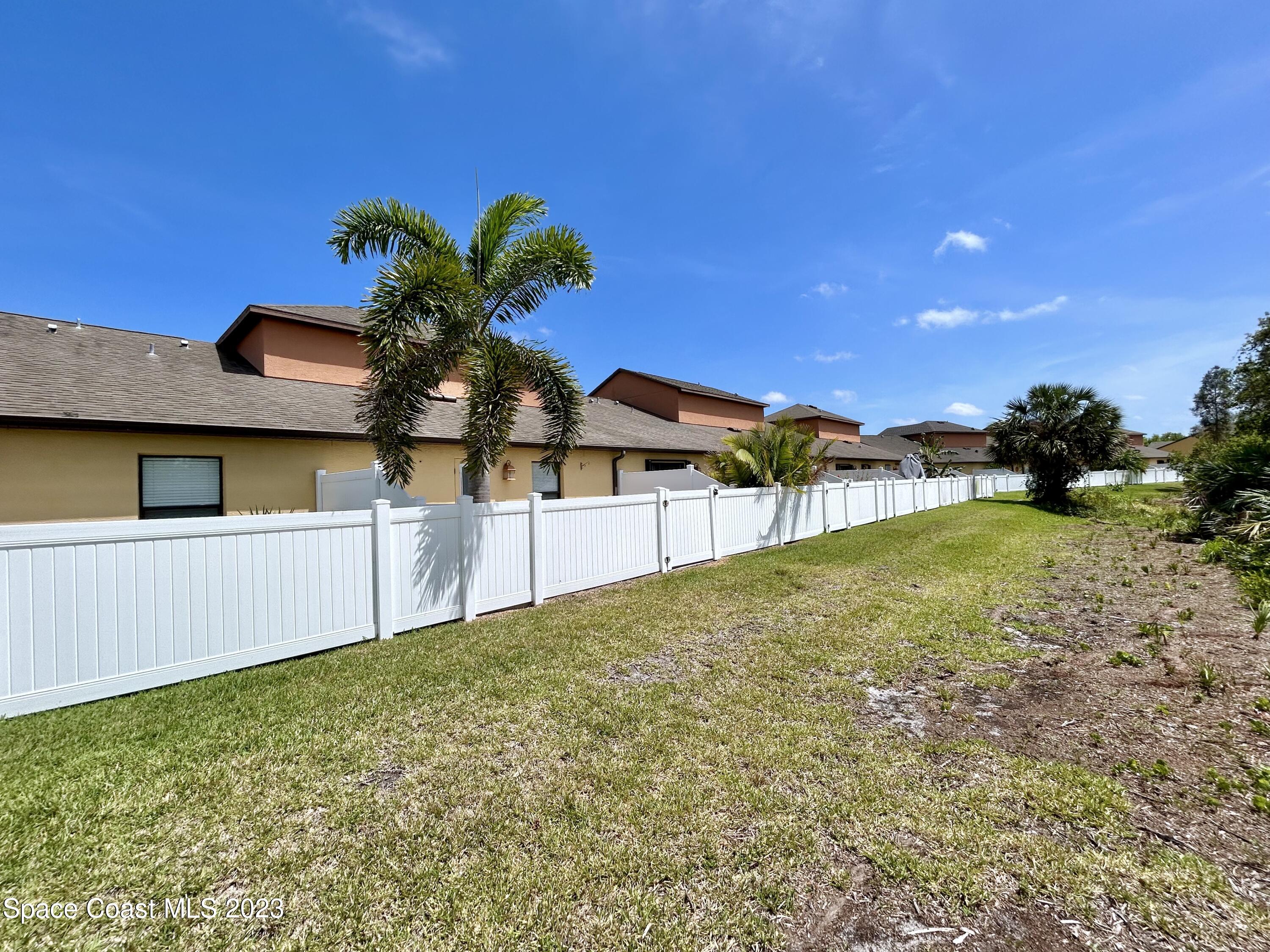 1160 Luminary Circle, Unit 105 Melbourne, FL 32901 - Photo 7 of 35 a view of outdoor space and yard