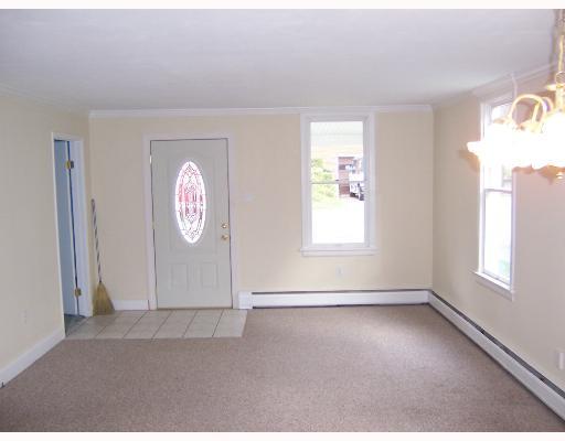 835 Walnut Street Rochester, PA 15074 - Photo 7 of 17 Living Room. ENTRY AND LIVING ROOM OFF THE FRONT PORCH