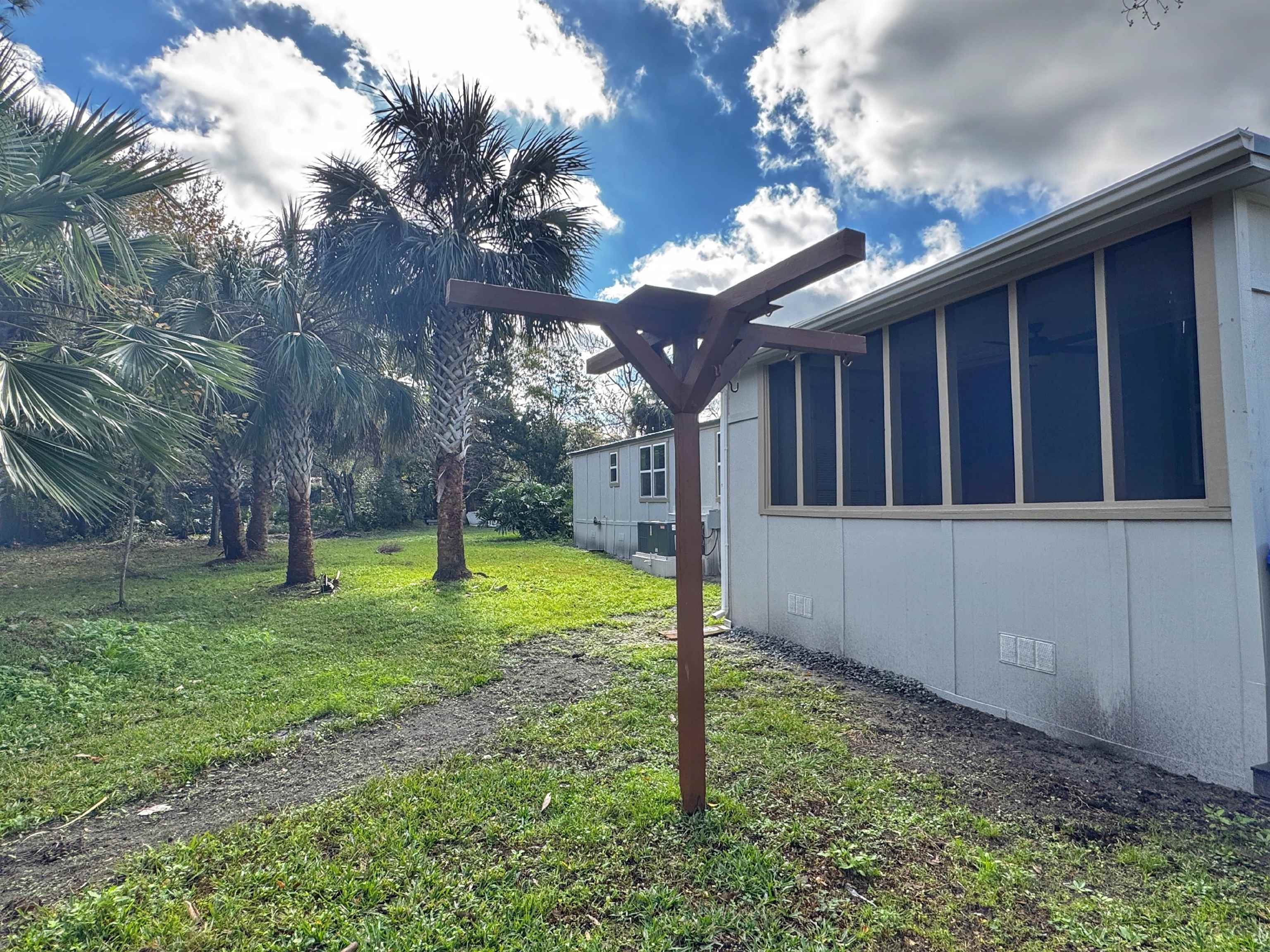 4062 Quail Drive St. Augustine, FL 32084 - Photo 38 of 39 a view of a house with a backyard