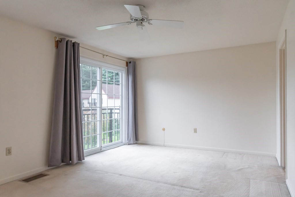 3 East Ridge Road, Unit 3 Merrimack, NH 03054 - Photo 10 of 17 a view of an empty room with a window