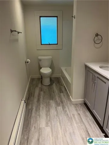 a bathroom with a sink and a toilet