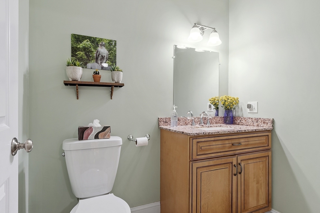 191 Scotland Road, Unit 2 Newbury, MA 01951 - Photo 18 of 37 a bathroom with a toilet a sink and mirror