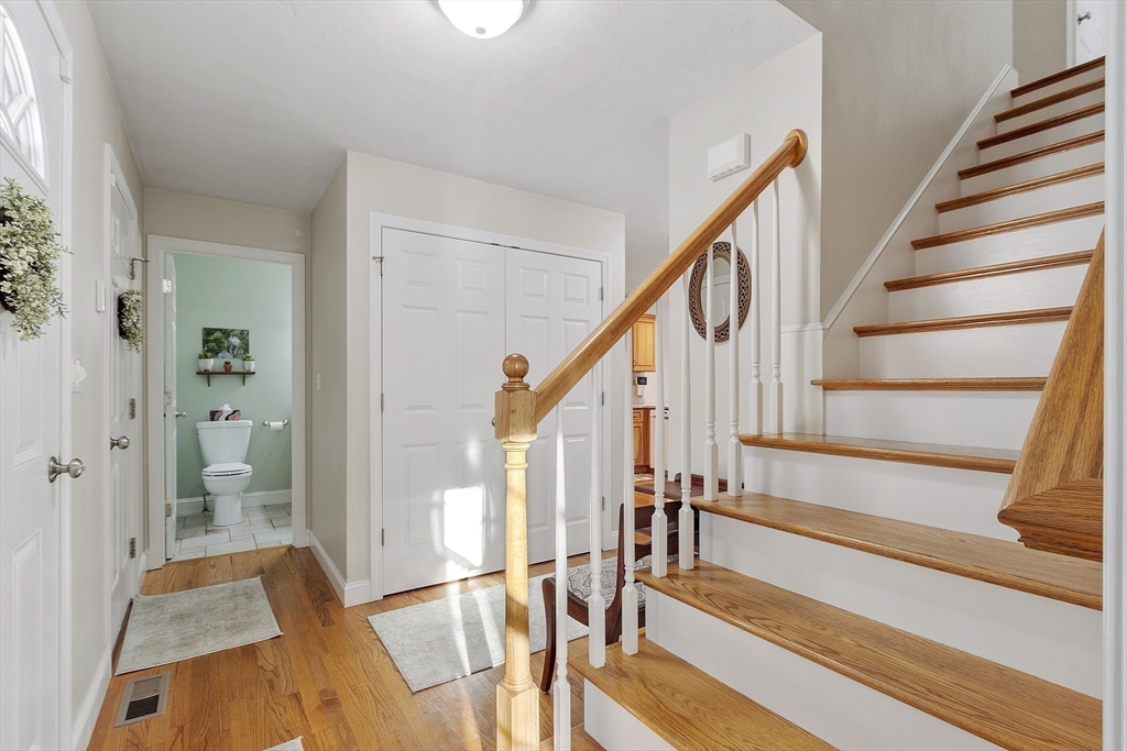 191 Scotland Road, Unit 2 Newbury, MA 01951 - Photo 5 of 37 a view of entryway and hall with wooden floor