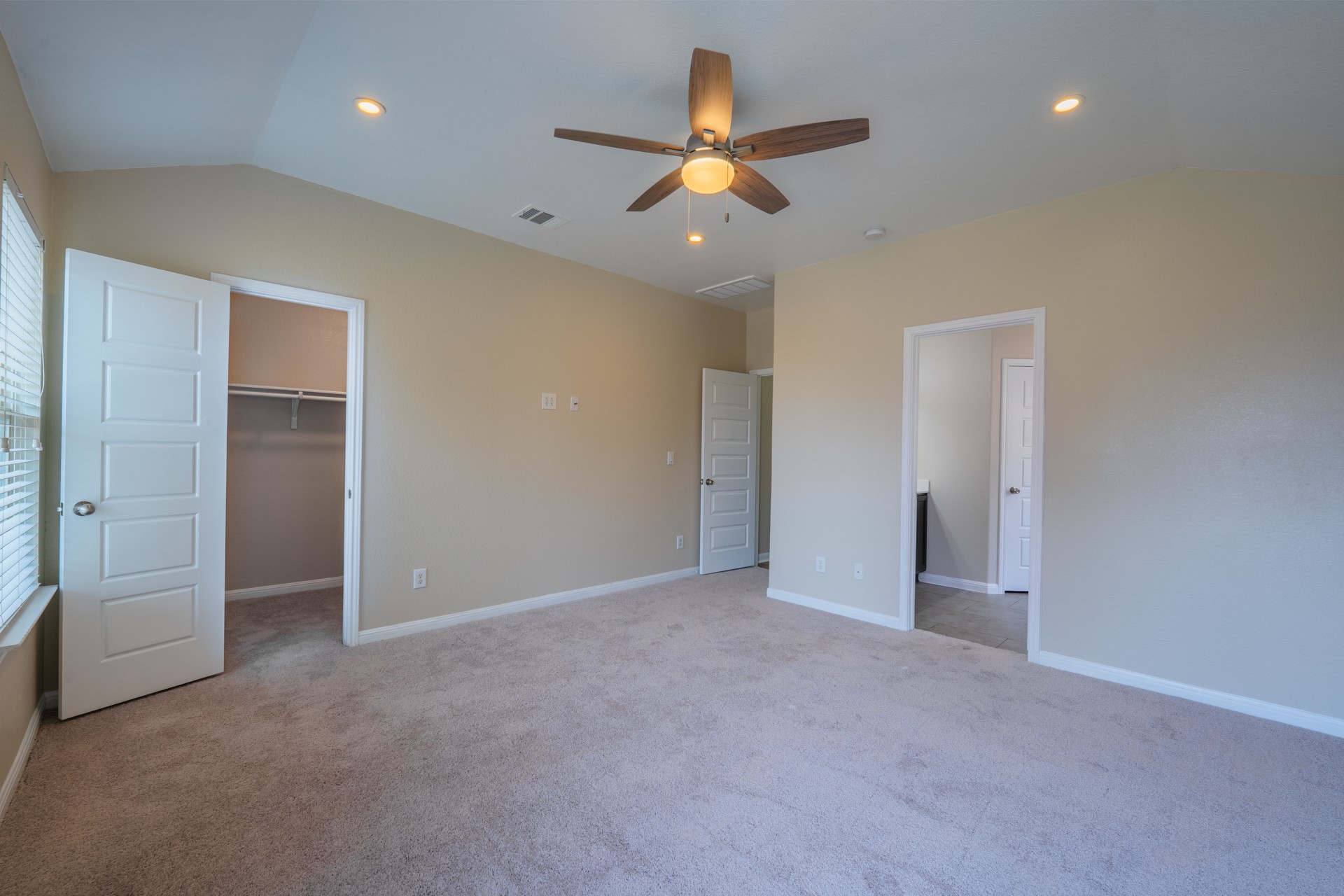 624 Joppa Road Leander, TX 78641 - Photo 16 of 36 an empty room with closet and windows