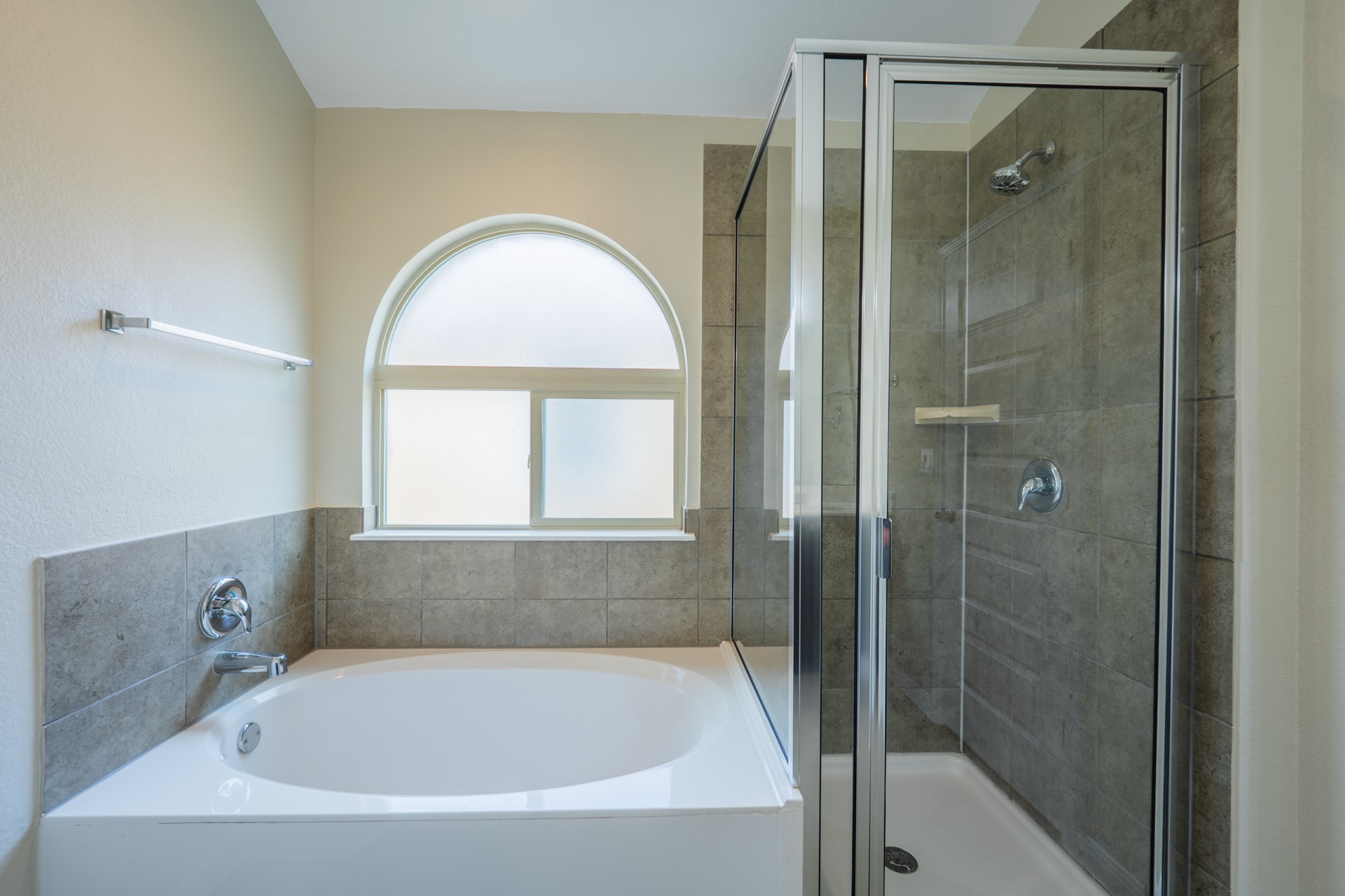 624 Joppa Road Leander, TX 78641 - Photo 20 of 36 a white bath tub sitting next to a shower