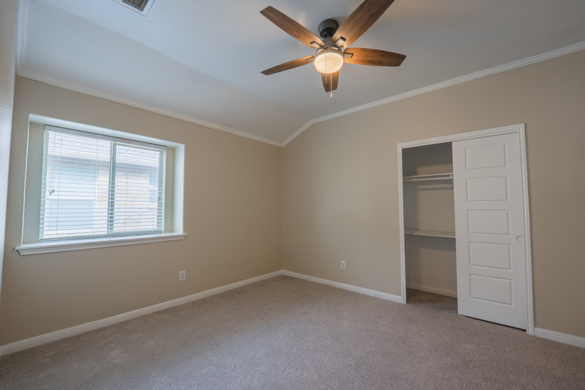 624 Joppa Road Leander, TX 78641 - Photo 25 of 36 an empty room with a window and a fan