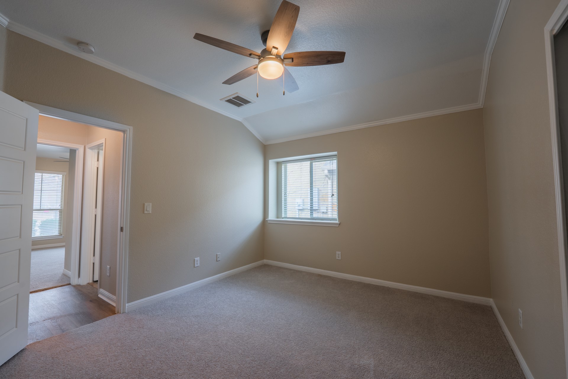 624 Joppa Road Leander, TX 78641 - Photo 26 of 36 an empty room with a window and a fan