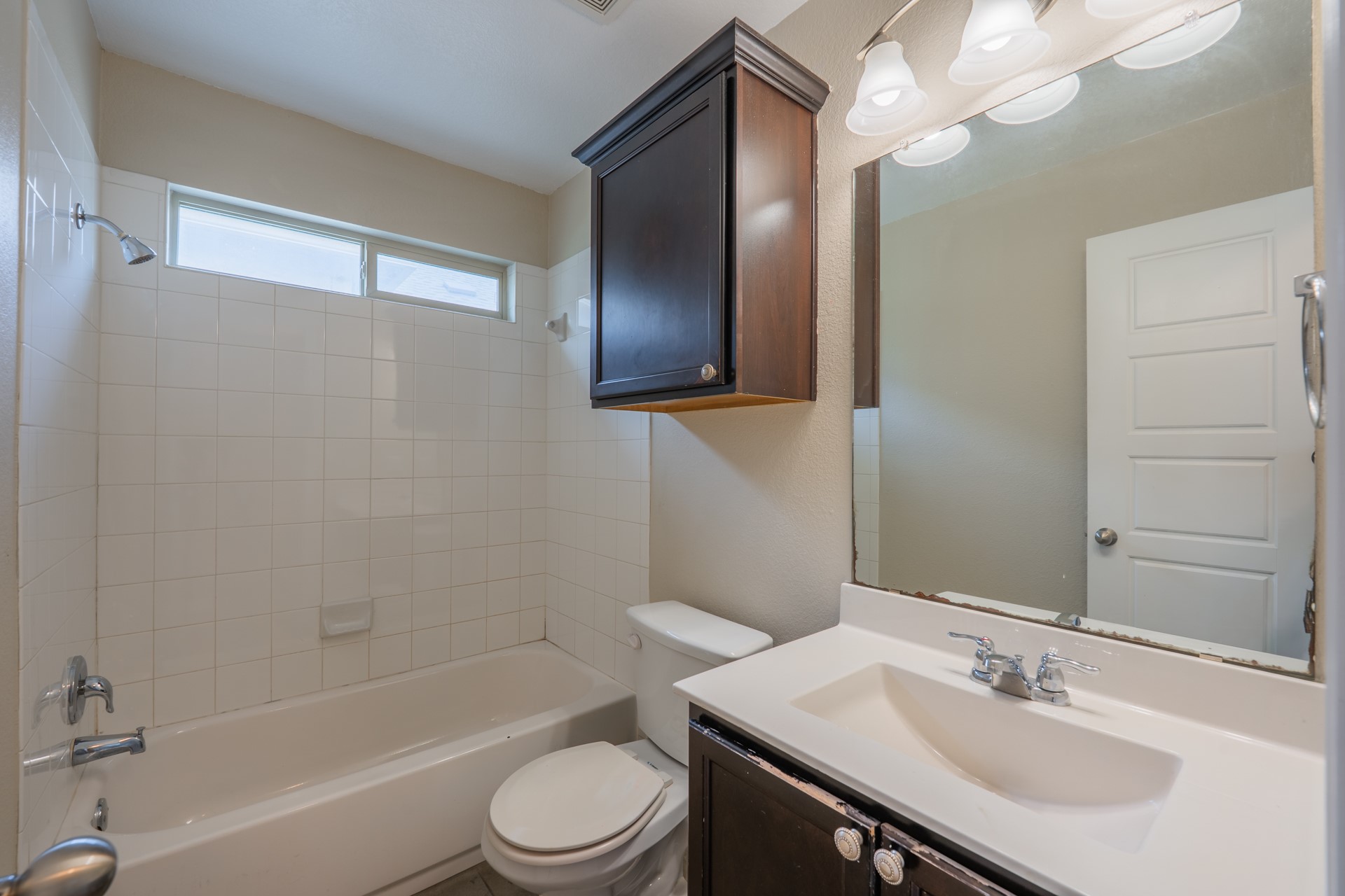 624 Joppa Road Leander, TX 78641 - Photo 27 of 36 a bathroom with a sink a toilet and shower