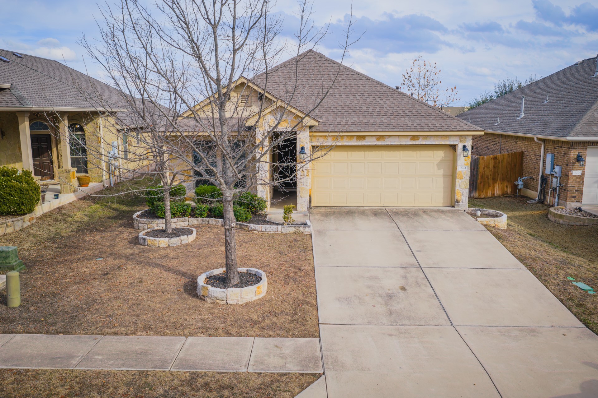 624 Joppa Road Leander, TX 78641 - Photo 34 of 36 a backyard of a house with yard and outdoor seating